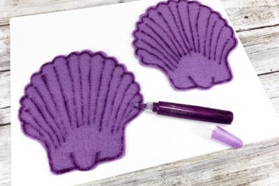 Outlining Seashells with Glitter Glue