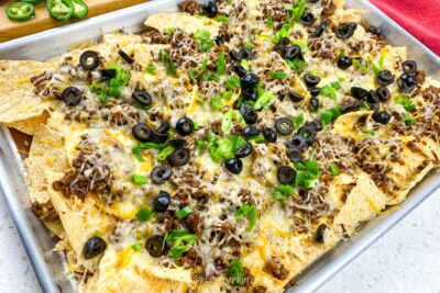 Adding Olives and Jalapeno to Nachos
