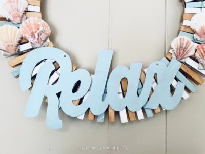 Wooden Relax Sign on Wreath