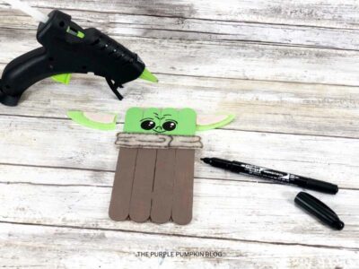 Gluing Ears to Baby Yoda
