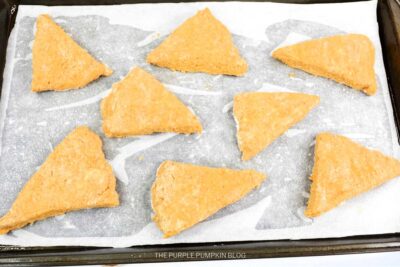 Pumpkin Scone Dough Cut into Triangles