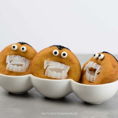 Plastic Vampire Teeth Added to Doughnuts
