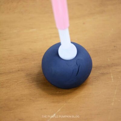 Pressing Ball Tool into Fondant