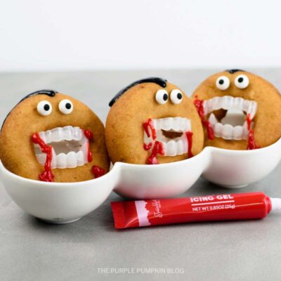 Red Icing Added to Doughnut Teeth