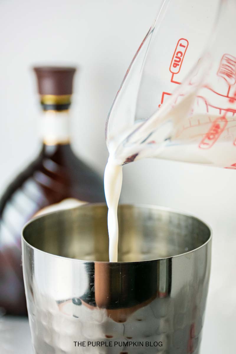 Pouring Ingredients into Cocktail Shaker