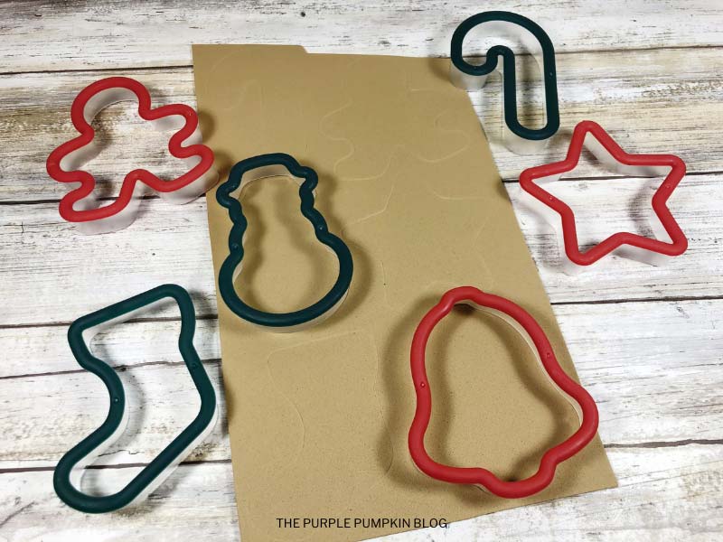 Pressing Cookie Cutters into Craft Foam