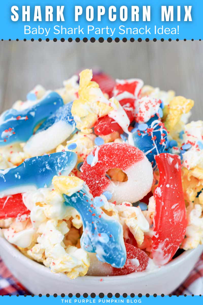 A bowl filled with popcorn, and gummy sharks candy, drizzled with melted white chocolate and red and blue sprinkles. The text overlay says "Shark Popcorn Mix - Baby Shark Party Snack Idea!". Similar photos of the recipe from various angles are used throughout with different text overlays unless otherwise described.