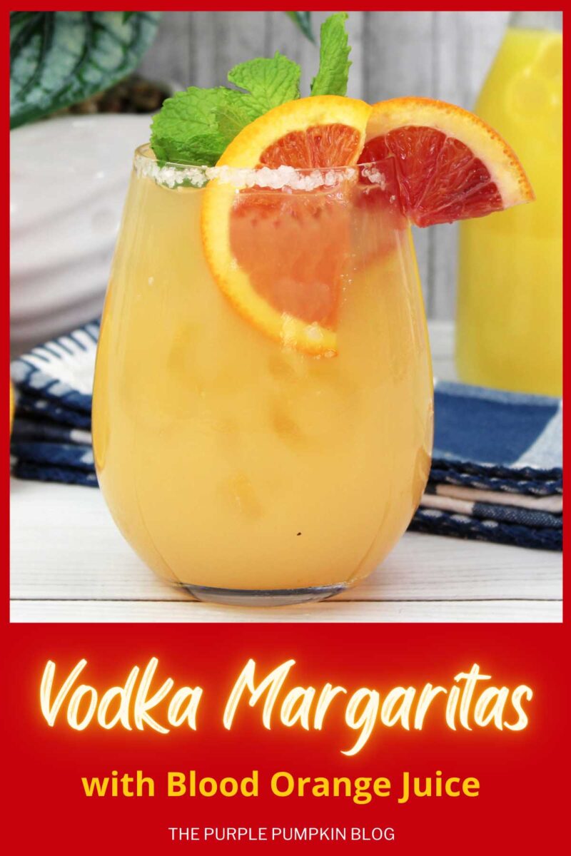 A glass of orange margarita with salted glass rim, blood orange slices and fresh mint. The text overlay says"Vodka Margaritas with Blood Orange Juice" Unless otherwise described, images of the same cocktail feature throughout with different text overlays.