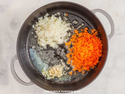 Aromatics - garlic, onions, and carrots in Soup Pan