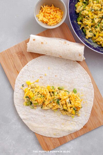 Assembling the burritos - filling laid onto a tortilla ready for wrapping.