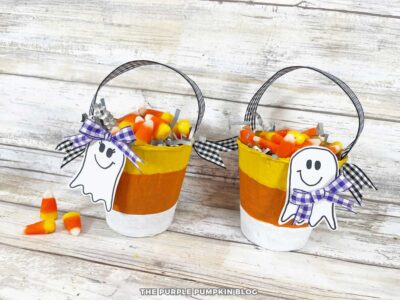 Adding Candy Corn to Mini Buckets