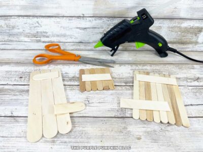 Arranging Craft Sticks to Make Bottles