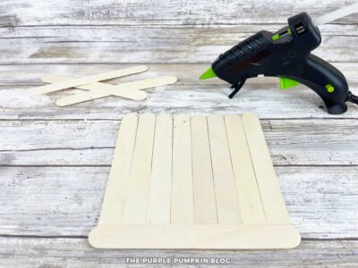 Assembling Craft Sticks for Halloween Sign