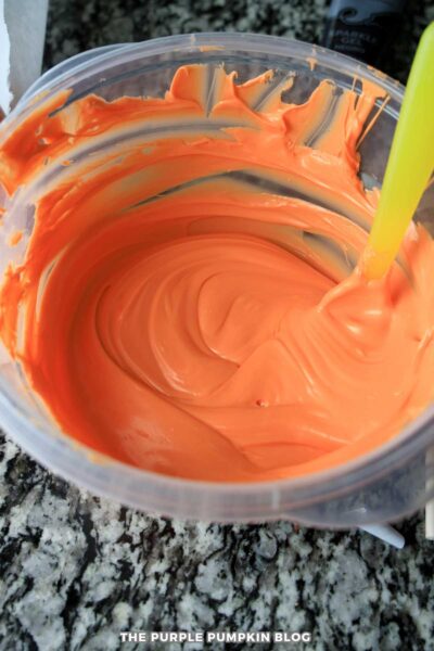 Melted Orange Candy Melts in a Bowl
