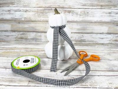 Tying Ribbon Around Stack