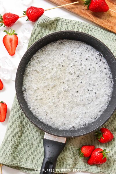 bubbling sugar in pan