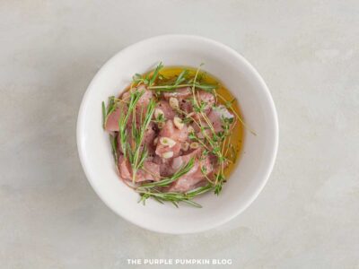 Greek souvlaki porkcovered in marinade ready to soak up flavors