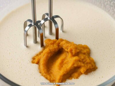 Whisking Pumpkin Puree into Cream