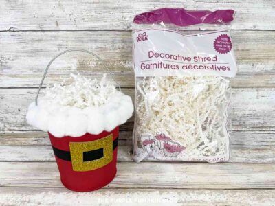 Adding Crinkle Paper to Bucket