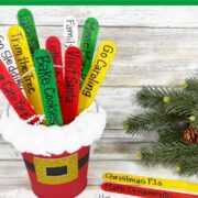 A festive Christmas bucket list craft with decorated red bucket and colorful "to-do" sticks for holiday fun. Text overlay says " Christmas Bucket List Craft Idea - Fun for all the family!