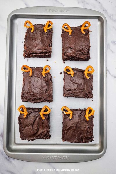Adding Broken Pretzel Antlers to Brownie Reindeers