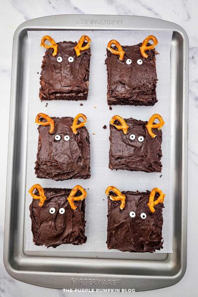 Adding Candy Eyes to Reindeer Brownies