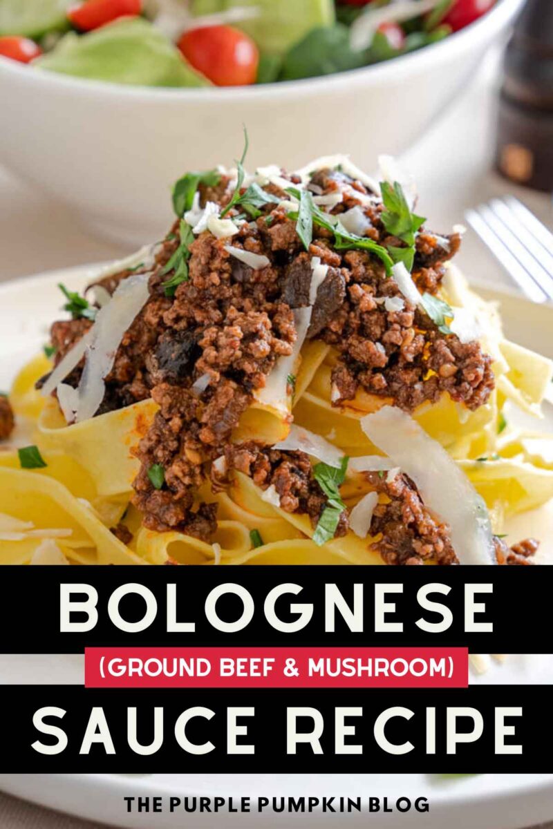 Close-up of homemade bolognese sauce with ground beef and mushrooms on pasta.
